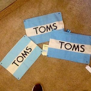 3 TOMS shoe bags